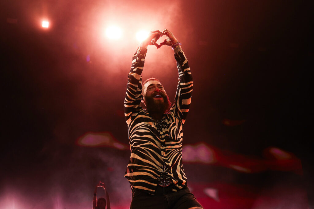 LAS VEGAS, NEVADA - DECEMBER 31: Post Malone performs onstage as Fontainebleau Las Vegas rings in 2024 with a symphony of property-wide live entertainment at Fontainebleau Las Vegas on December 31, 2023 in Las Vegas, Nevada.